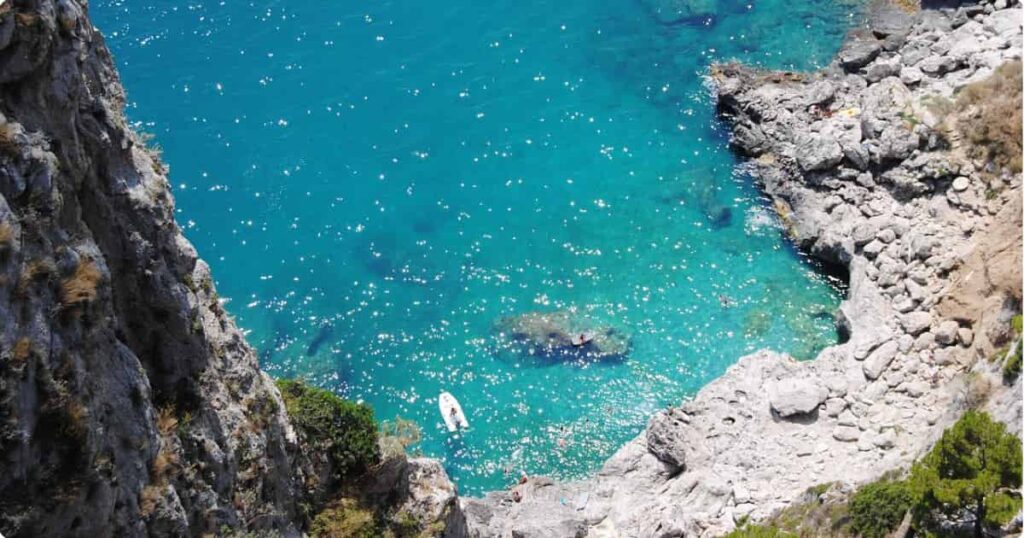 Capri town Piazzetta with open-air cafés and white buildings, island of Capri Italy