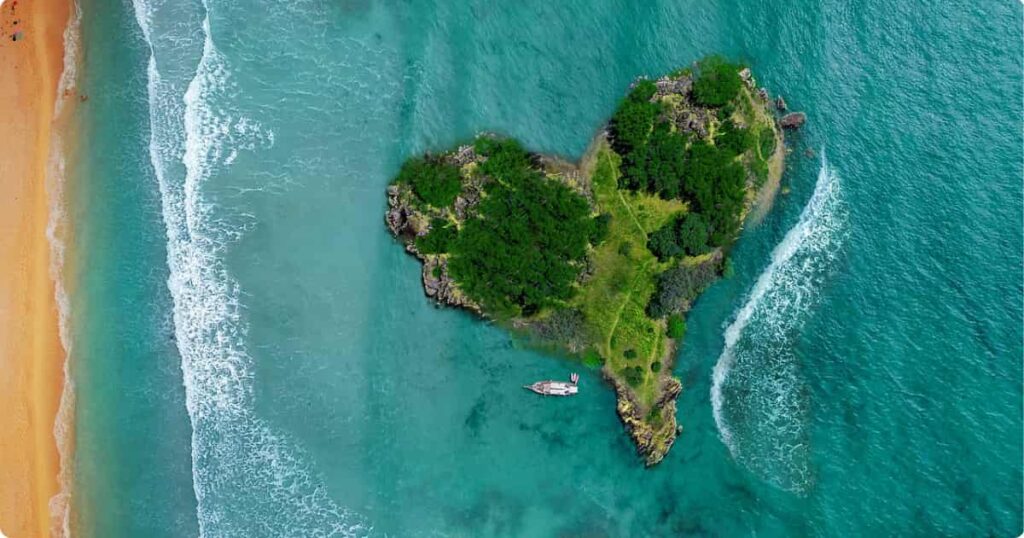 Moorea, French Polynesia: Complete Travel Guide Aerial view of Moorea island, French Polynesia, showing turquoise lagoon and volcanic peaks