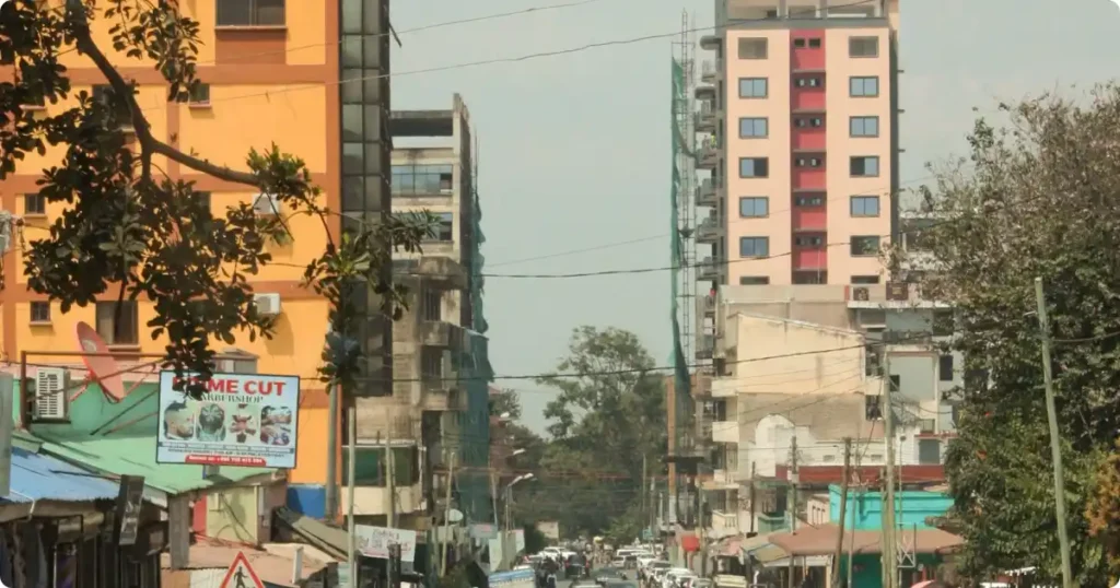 Urban street scene in South Africa showing the visible contrast between modern infrastructure and everyday local life