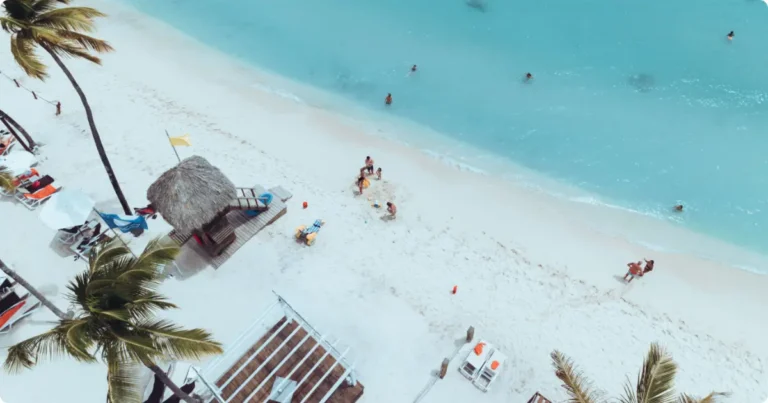 Best Restaurants in Aruba: Palm Beach, Fine Dining & Local Eats Aerial view of Aruba's Palm Beach coastline with turquoise Caribbean water and white sand