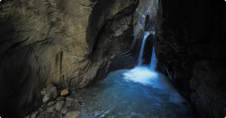 Kozjak Waterfall hidden inside limestone cave near Kobarid Slovenia complete trail guide