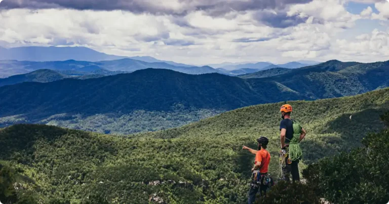 Hiker overlooking Appalachian highland balds on Mount Rogers hike Virginia at golden hour