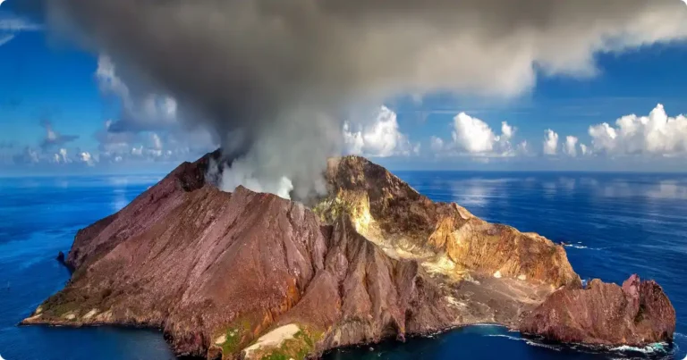 Saba Island: The Caribbean’s Best-Kept Secret Aerial view of Saba island volcanic peak rising dramatically from turquoise Caribbean Sea, Saba Caribbean