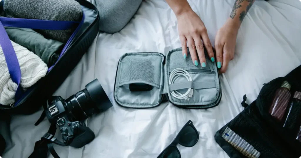 Travel gear material quality — neoprene polycarbonate and PVC dry bag textures close-up comparison