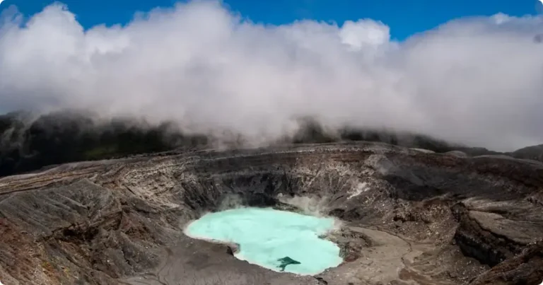 Turquoise crater lake inside Poás Volcano National Park, one of the best day trips from San José, Costa Rica
