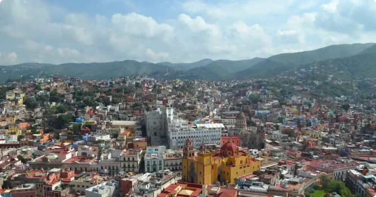 Aerial view of Guanajuato Mexico's colorful hillside houses and colonial architecture, UNESCO World Heritage City