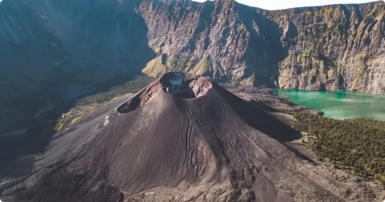 Aerial view of Lake Atitlán Guatemala with San Pedro and Tolimán volcanoes rising above the caldera