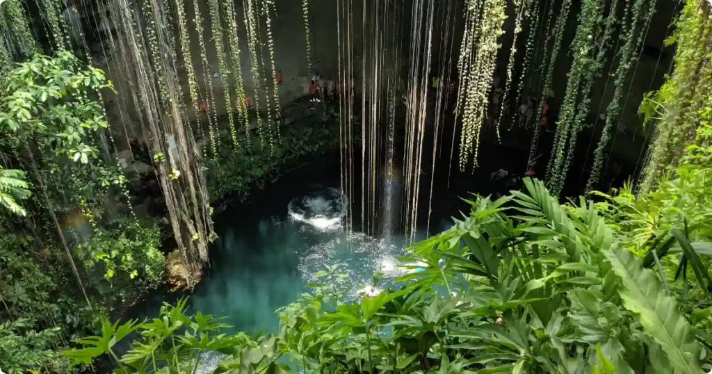 Natural cenote swimming hole in Yucatan Mexico — adventure activities comparison Caribbean vs Mexico holiday
