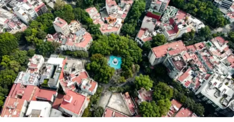 Aerial view of Mexico City's tree-lined colonias and Art Deco neighborhoods