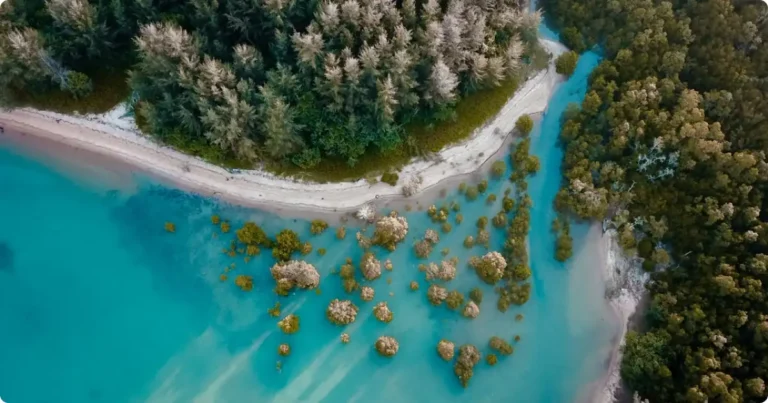 Aerial view of Secret Beach Belize showing shallow turquoise lagoon waters on the west coast of Ambergris Caye